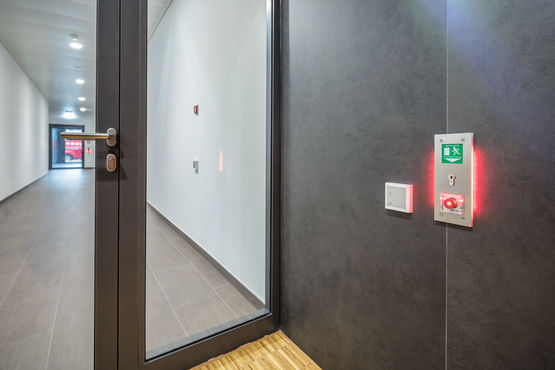 Automatic door systems within escape and rescue routes
